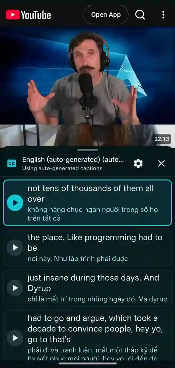 DualSub Replay on an Android phone: a YouTube video on top and English subtitles with Vietnamese translations below, each with a replay button
